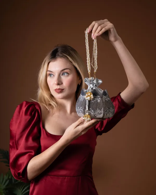 Midnight_Mirage_–_Luxury_Silver_Beaded_Lotus_Potli_Bag_with_Pearl_Handle